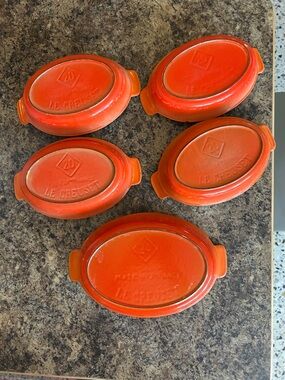 Vintage collection of Le Creuset Set of 5 Orange Mini Oval Au Gratin